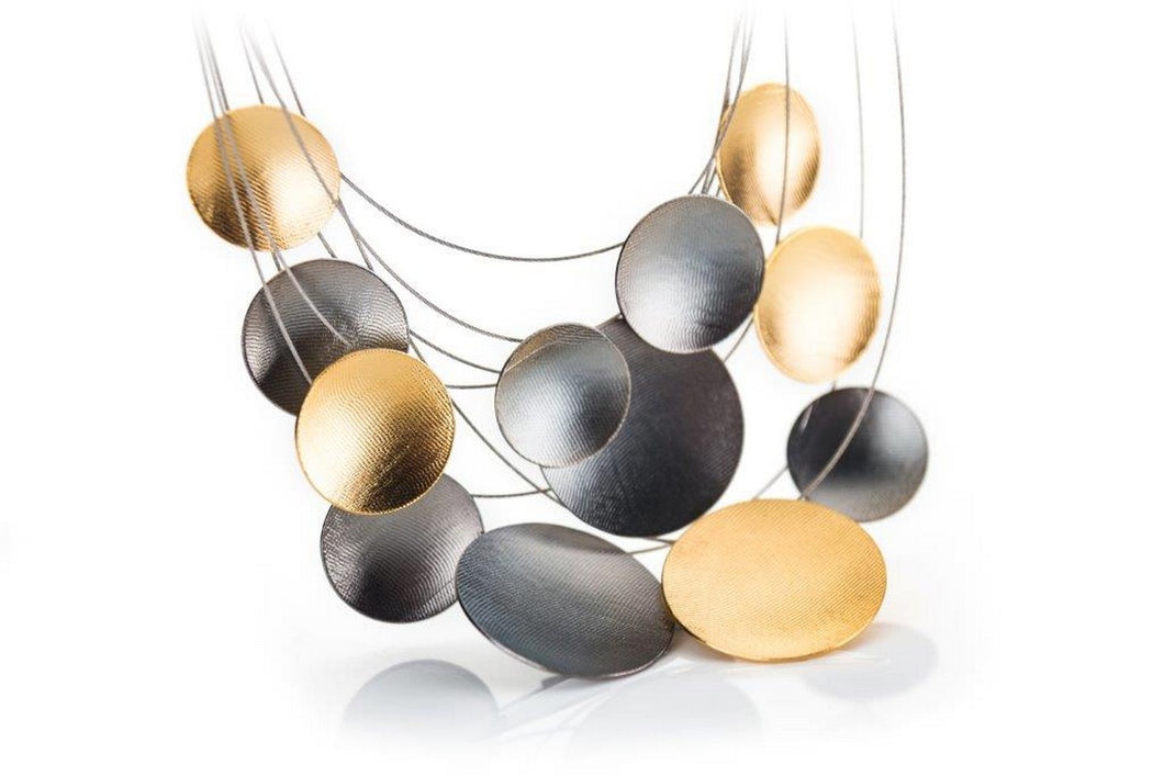 Necklace set in oxidized sterling silver and gold plated